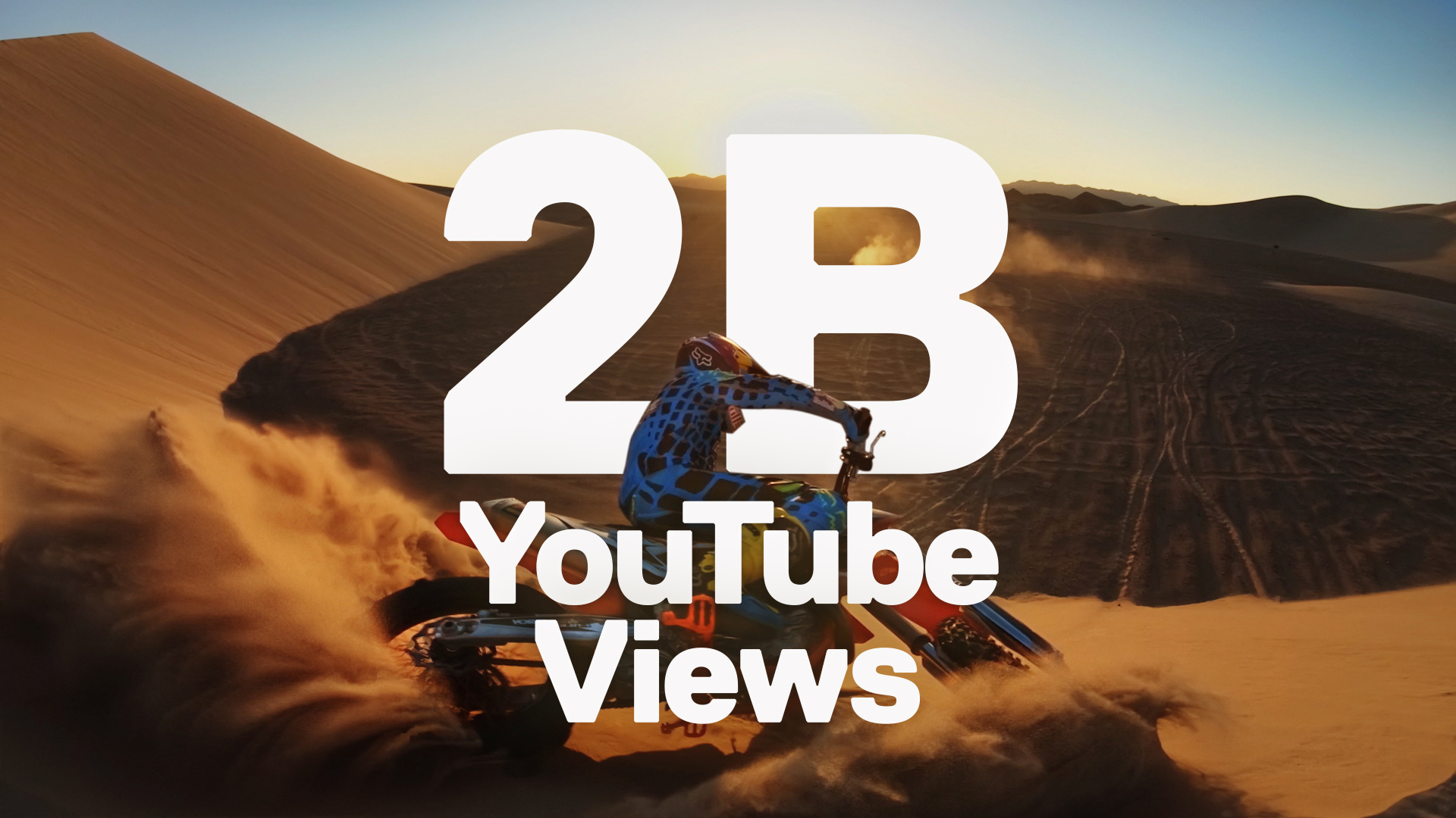 2 Billion Views Graphic with Motorcycle